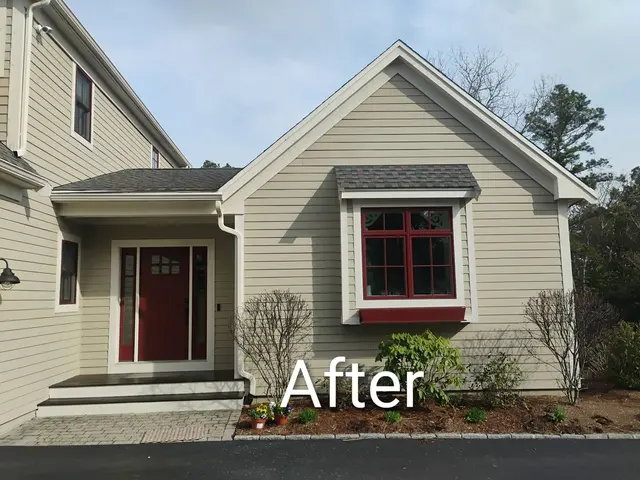 Exterior repaint with refinished entry, after