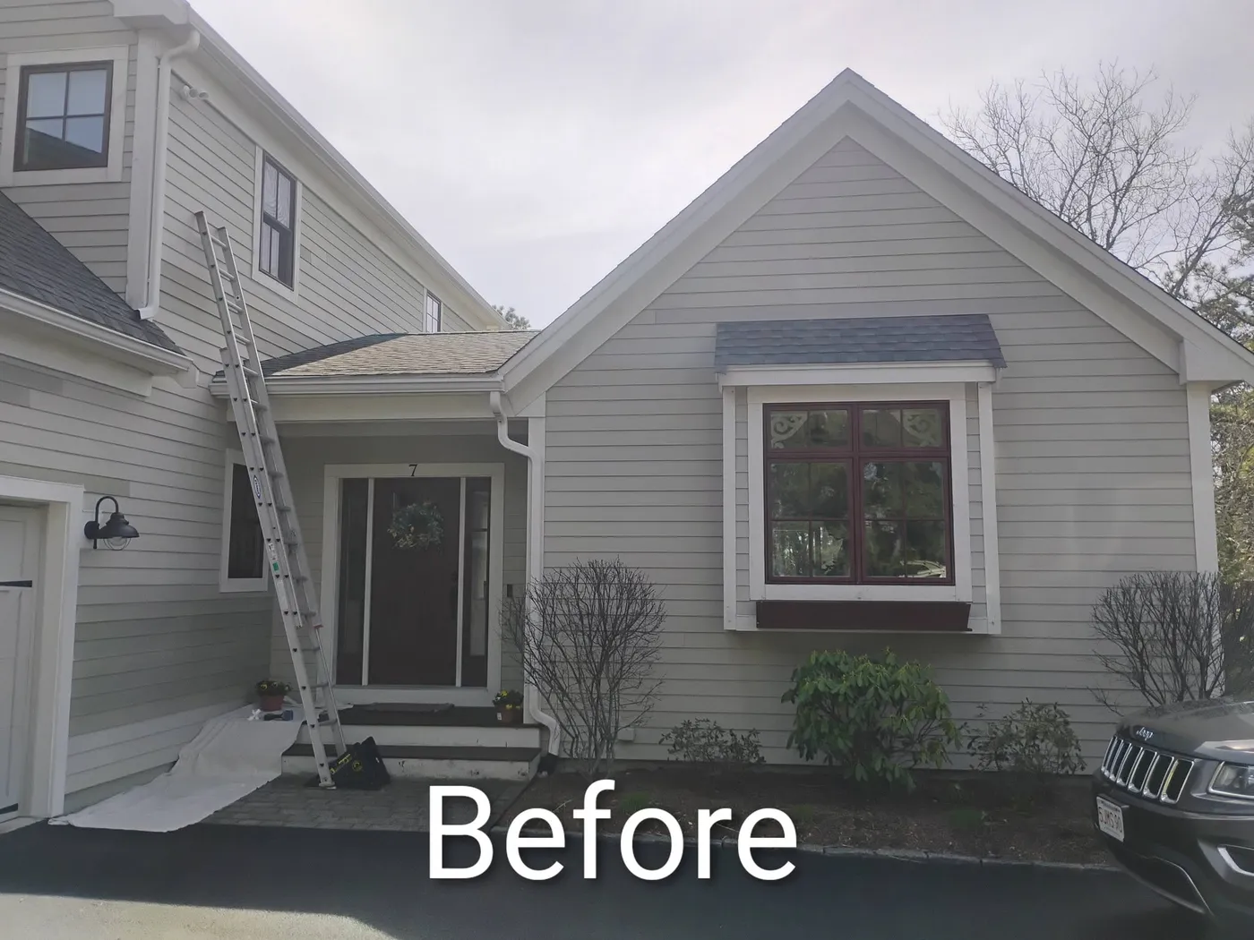 Exterior repaint with refinished entry, before